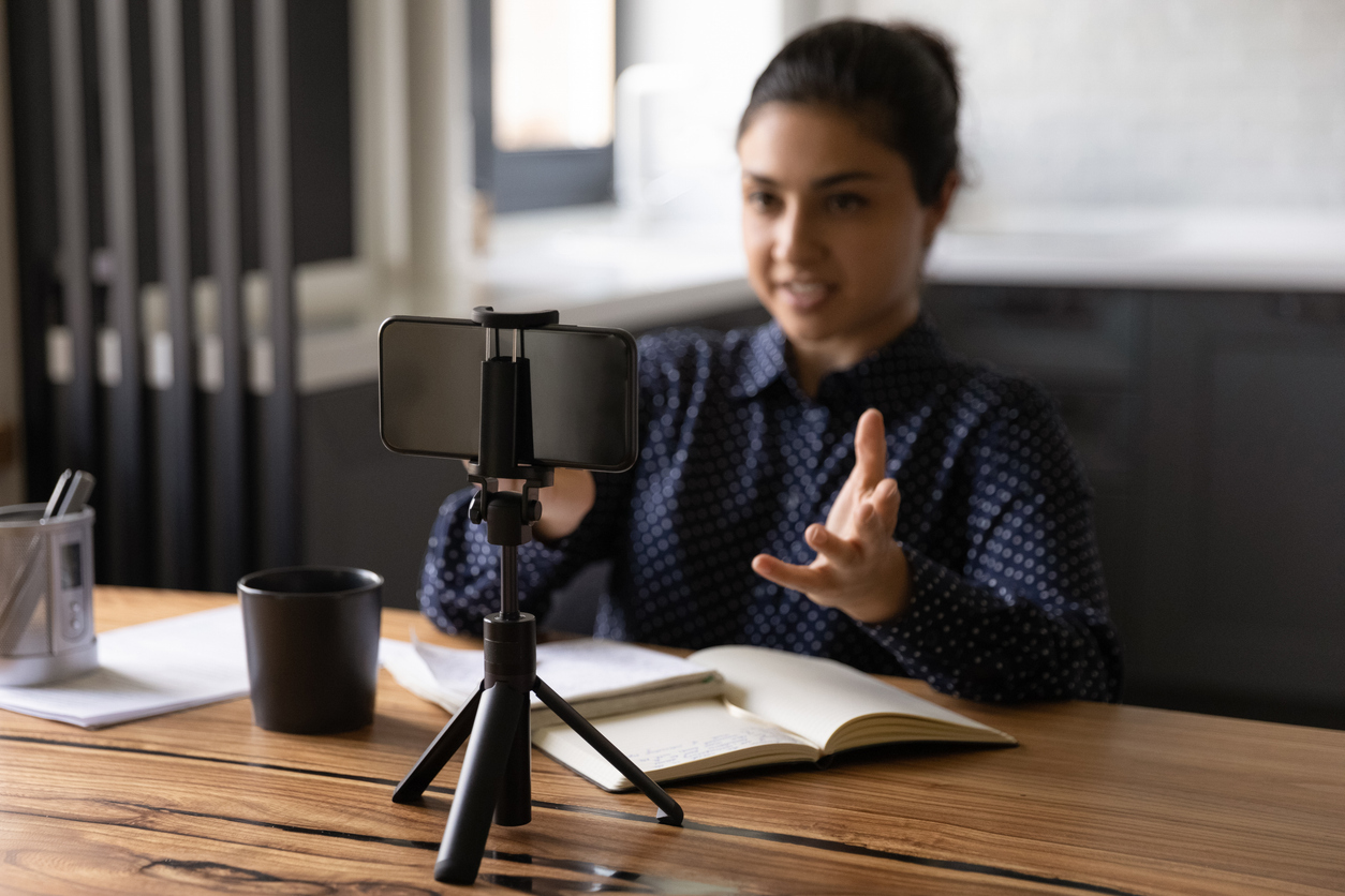 Woman recording video blog